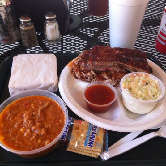 Photo taken at Old Brick Pit Barbecue by Casey W. on 6/27/2012