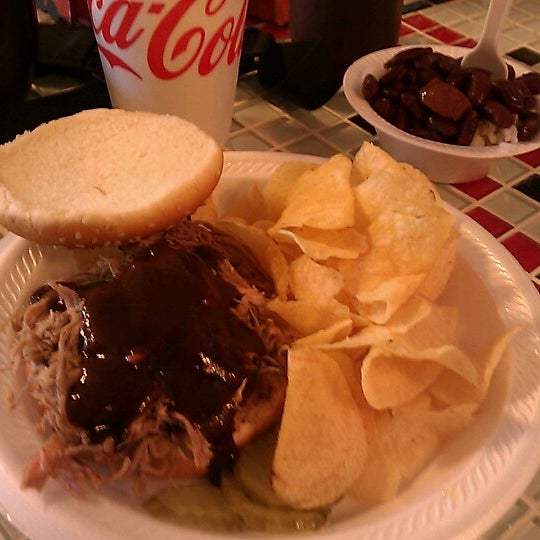 Photo taken at The Bar-B-Que Caboose Cafe by Richard C. on 9/1/2012