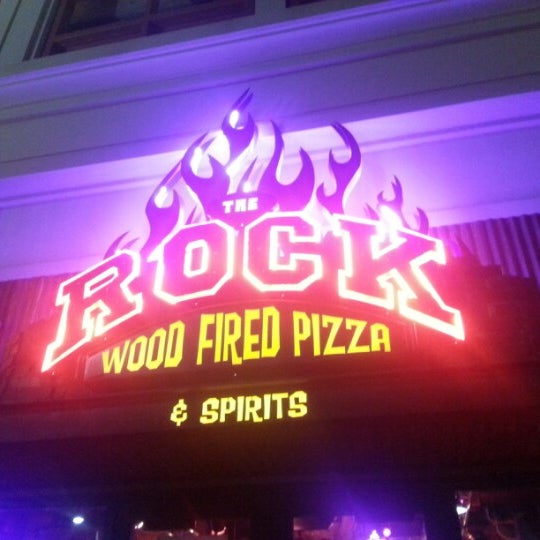 Photo taken at The Rock Wood Fired Pizza by Carl C. on 9/1/2012