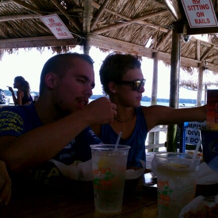 Photo taken at Gator Joe&#39;s Beach Bar &amp; Grill by Cherrie D. on 8/25/2012