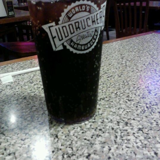 Photo taken at Fuddruckers by Christine P. on 2/22/2012