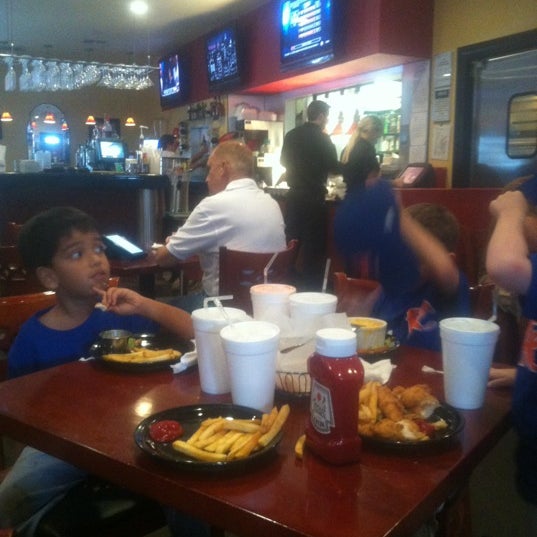 Photo taken at Eats American Grill by Daniel S. on 3/31/2012