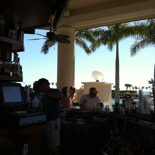 Photo taken at The Nauti Mermaid Dockside Bar &amp; Grill by Mark M. on 4/8/2012