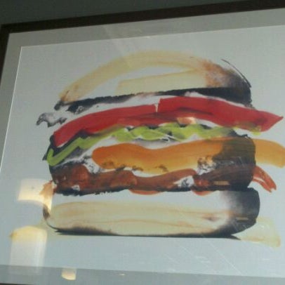 Photo taken at Dave &amp; Tony&#39;s Premium Burger Joint by John C. on 3/17/2012