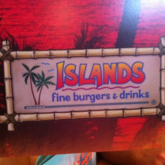 Photo taken at Islands Restaurant by Andy R. on 3/16/2012