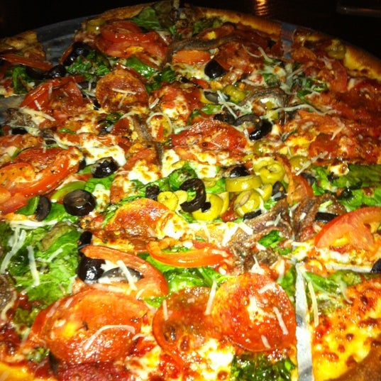 Foto tomada en Palio&#39;s Pizza Cafe  por Martha D. el 6/10/2012