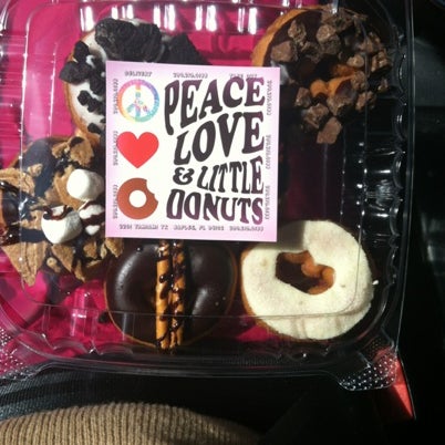 Photo taken at Peace Love &amp; Little Donuts by Ally D. on 8/2/2012