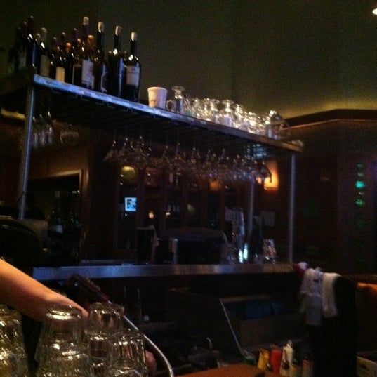 Photo taken at Bar Louie by Krista D. on 3/7/2012