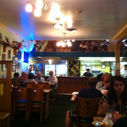 Photo taken at Alejo&#39;s Presto Trattoria Italian Restaurant by John C. on 5/21/2012