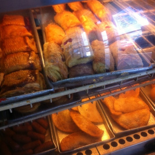 Photo taken at Miramar Bakery by Danny D. on 2/28/2012