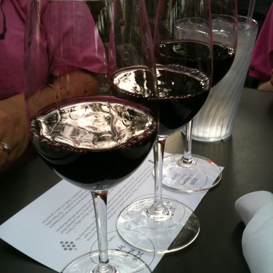 Photo taken at The Grove Wine Bar &amp; Kitchen - West Lake by June R. on 3/13/2012
