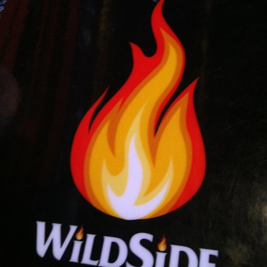 Photo taken at Wildside BBQ by Dan G. on 6/12/2012