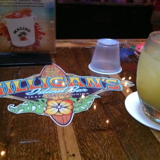 Photo taken at Gilligan&#39;s Island Bar and Grill by Furreal ®. on 6/23/2012