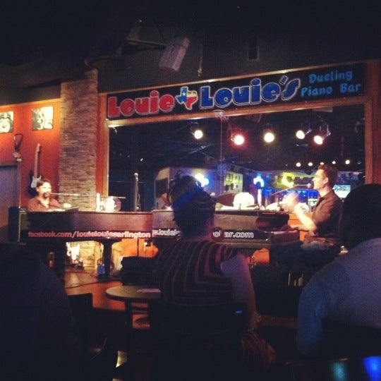 Photo taken at Louie Louie&#39;s Dueling Piano Bar by Annika W. on 5/19/2012