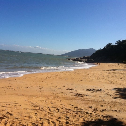 Photo taken at Praia Da Joana by Juliana D. on 5/9/2012