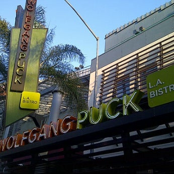 Photo taken at Wolfgang Puck Bistro by Jenny L. on 6/15/2012