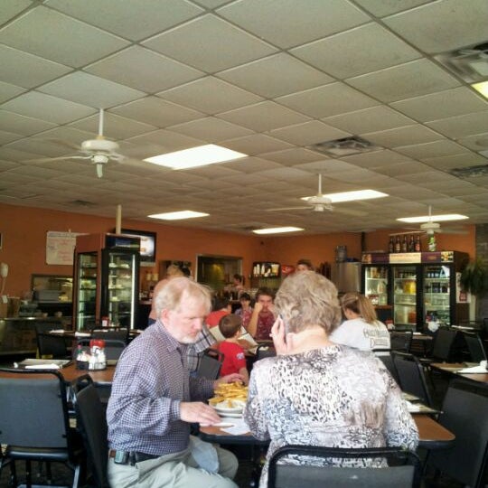 Photo taken at George&#39;s Restaurant by John W. on 3/5/2012
