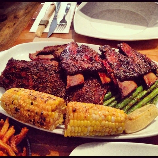 Photo taken at Barque Smokehouse by Carrie M. on 6/29/2012