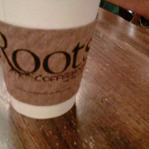 Photo taken at Roots Coffeehouse by Jeff L. on 8/24/2012