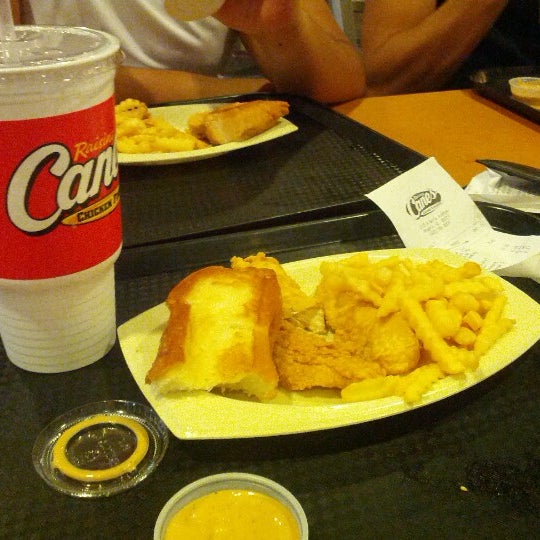 Photo taken at Raising Cane&#39;s Chicken Fingers by Andres H. on 8/12/2012