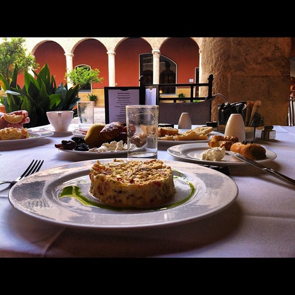 Photo taken at Restaurante El Claustro by John P. on 8/22/2012