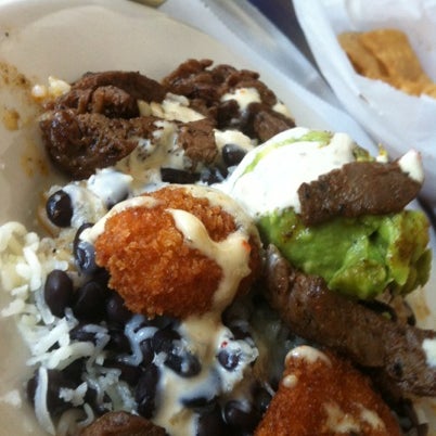 Foto diambil di Hightide Burrito Co. oleh Zark I. pada 7/28/2012