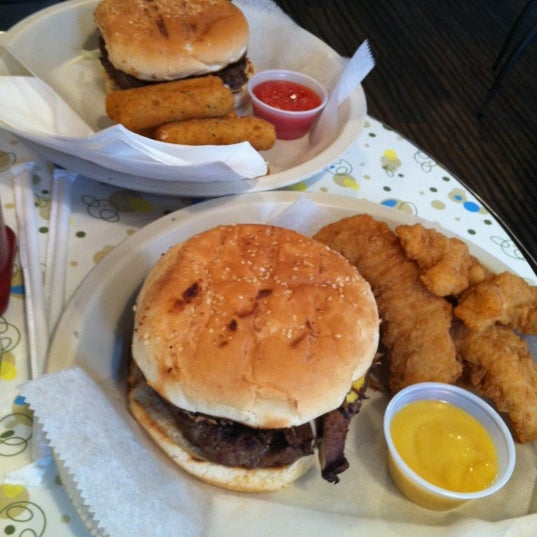 Photo taken at Joy Burger Bar by Cynthia L. on 4/1/2012
