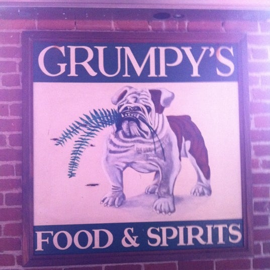 Photo taken at Grumpy&#39;s American Pub by Christian A. on 8/11/2012