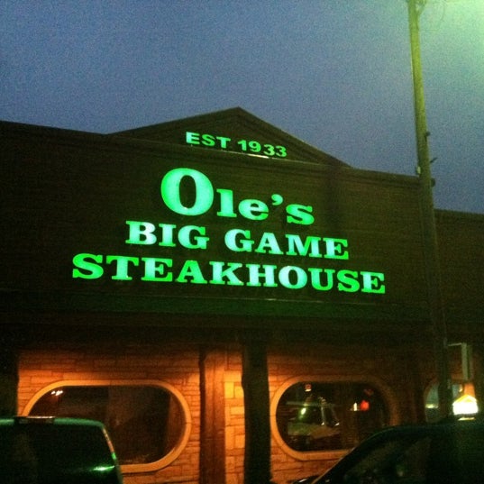 Photo taken at Ole&#39;s Big Game Steakhouse &amp; Lounge by Chris S. on 4/15/2012