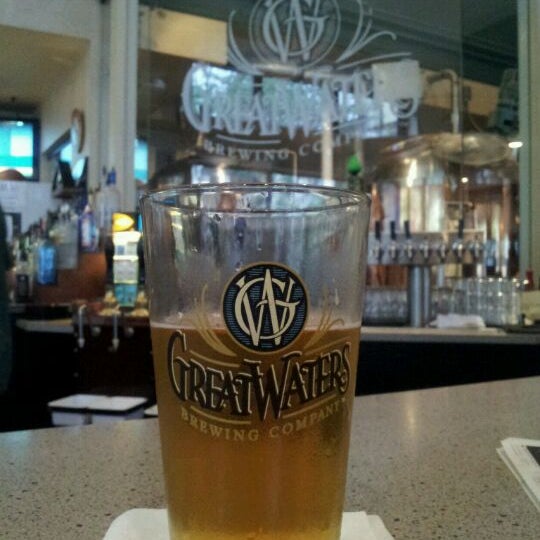 Photo taken at Great Waters Brewing Company by Ryan S. on 5/26/2012