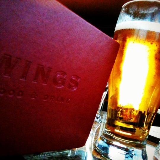 Снимок сделан в Wings Tap &amp; Grill пользователем Ryan S. 9/13/2012