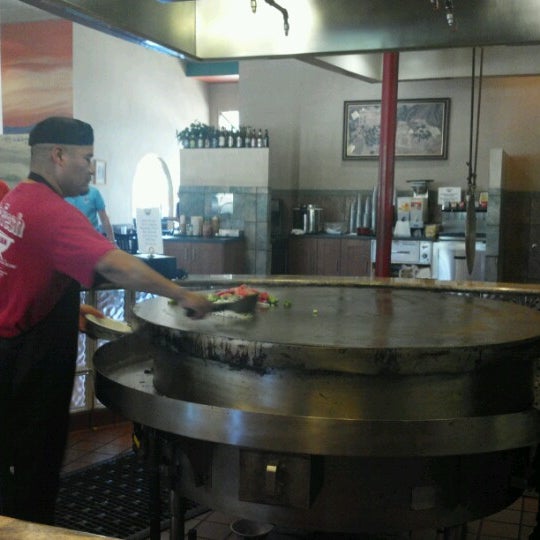 Photo taken at Stir Fresh Mongolian Grill by Jesse on 6/27/2012