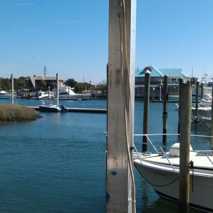 Photo taken at Fish House Grill by Catherine G. on 2/23/2012