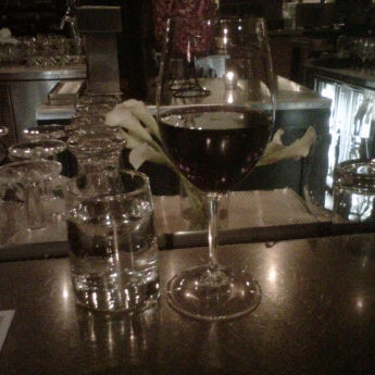 Photo taken at Vino Rosina Wine Bar by Gina G. on 4/24/2012