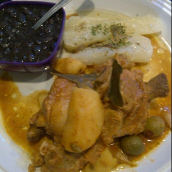 Foto tomada en Chago&#39;s Caribbean Cuisine  por Sherrl C. el 8/31/2012