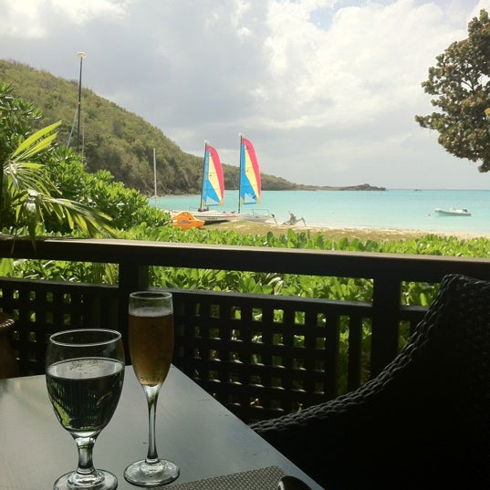Photo taken at Hermitage Bay - Antigua by Den P. on 3/25/2012