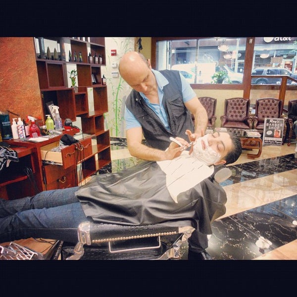 Photo taken at Ray&#39;s Barber Shop by Ray T. on 6/8/2012