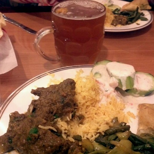 Photo taken at Spice Trade Brewing Company Restaurant by John T. on 2/6/2012