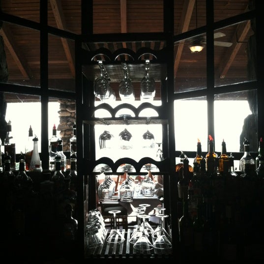 Photo taken at Great Hall Bar at The Grove Park Inn Resort &amp; Spa by Dolette M. on 4/2/2012