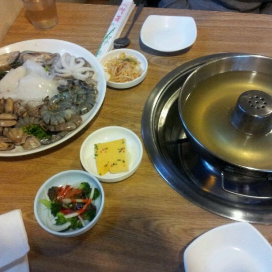 Photo taken at Shin Jung Restaurant by Robin L. on 3/19/2012