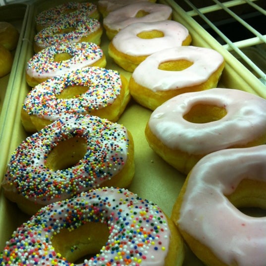 Photo taken at Ken&#39;s Donuts by Angela M. on 3/14/2012