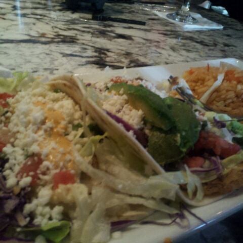 Photo taken at La Fiesta Mexican Restaurant by Stephanie T. on 3/8/2012