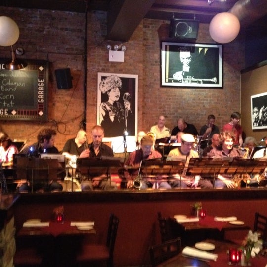 Photo taken at Garage Restaurant &amp; Cafe by Juan D. on 6/26/2012