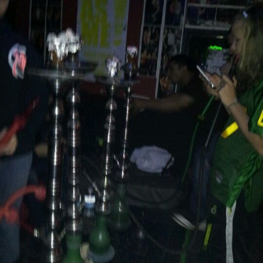 Photo taken at Al Narah Hookah Lounge by Cassandra J. on 4/26/2012