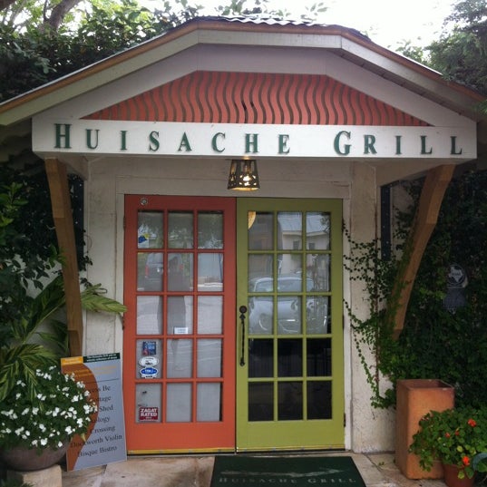 Photo taken at Huisache Grill and Wine Bar by Kurt W. on 6/30/2012