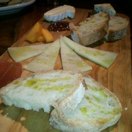 Photo taken at Salumi Tapas and Wine Bar by Joanne M. on 2/17/2012