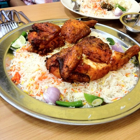 Photo taken at Al Raudah Arabian Food by faris safwan on 8/2/2012