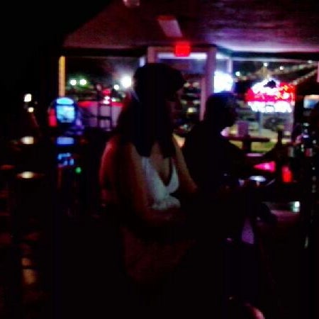 Photo taken at McGrady&#39;s Bar by Christophre W. on 7/17/2012