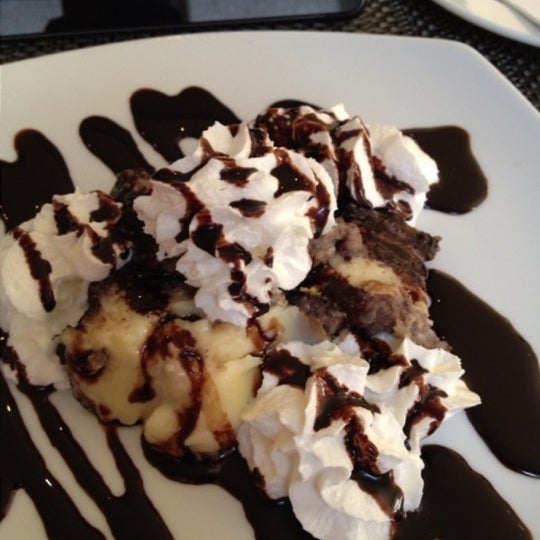 Somloi Galuska - must try this local dessert! It's a sponge cake with rum flavor, whipped cream and chocolate sauce... not too sweet, served cold and tastes great!