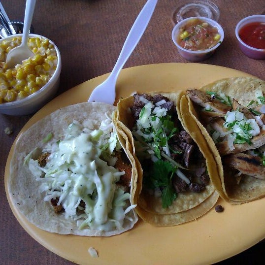 Photo taken at Carbon Live Fire Mexican Grill by Jeanne on 4/17/2012